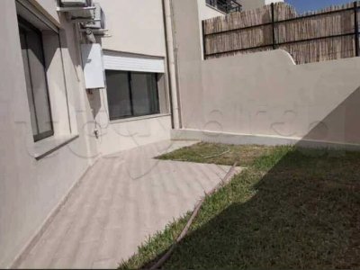 ENNASR 2 – Élégant Appartement S+2 avec Jardin Privatif