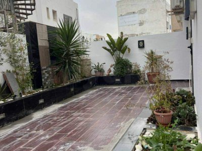 Appartement au rez-de-chaussée avec grand espace extérieur