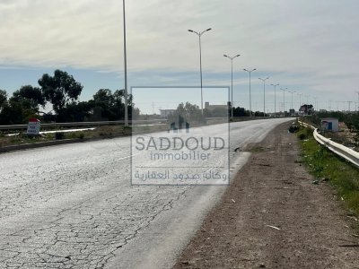 أرض 4942م للبيع طريق المطار كلم 10